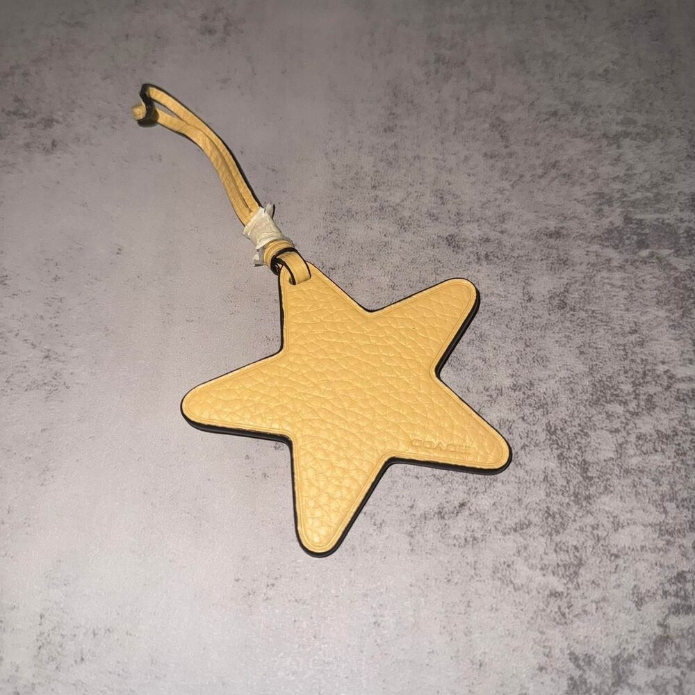 Coach Yellow star charm